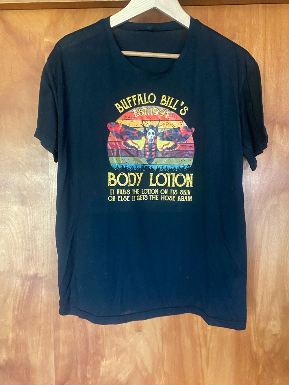 Buffalo Bill's Body Lotion Graphic Tee - Black with Yellow Print